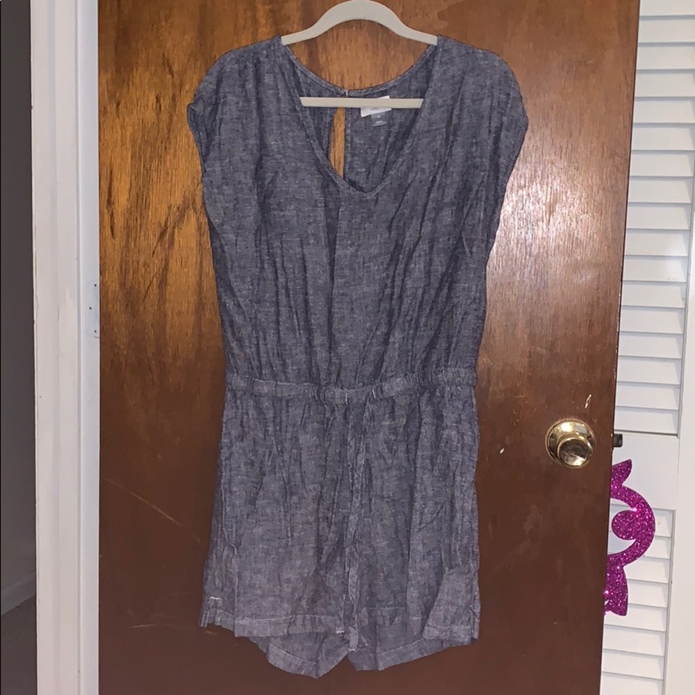 Blue shorts romper.